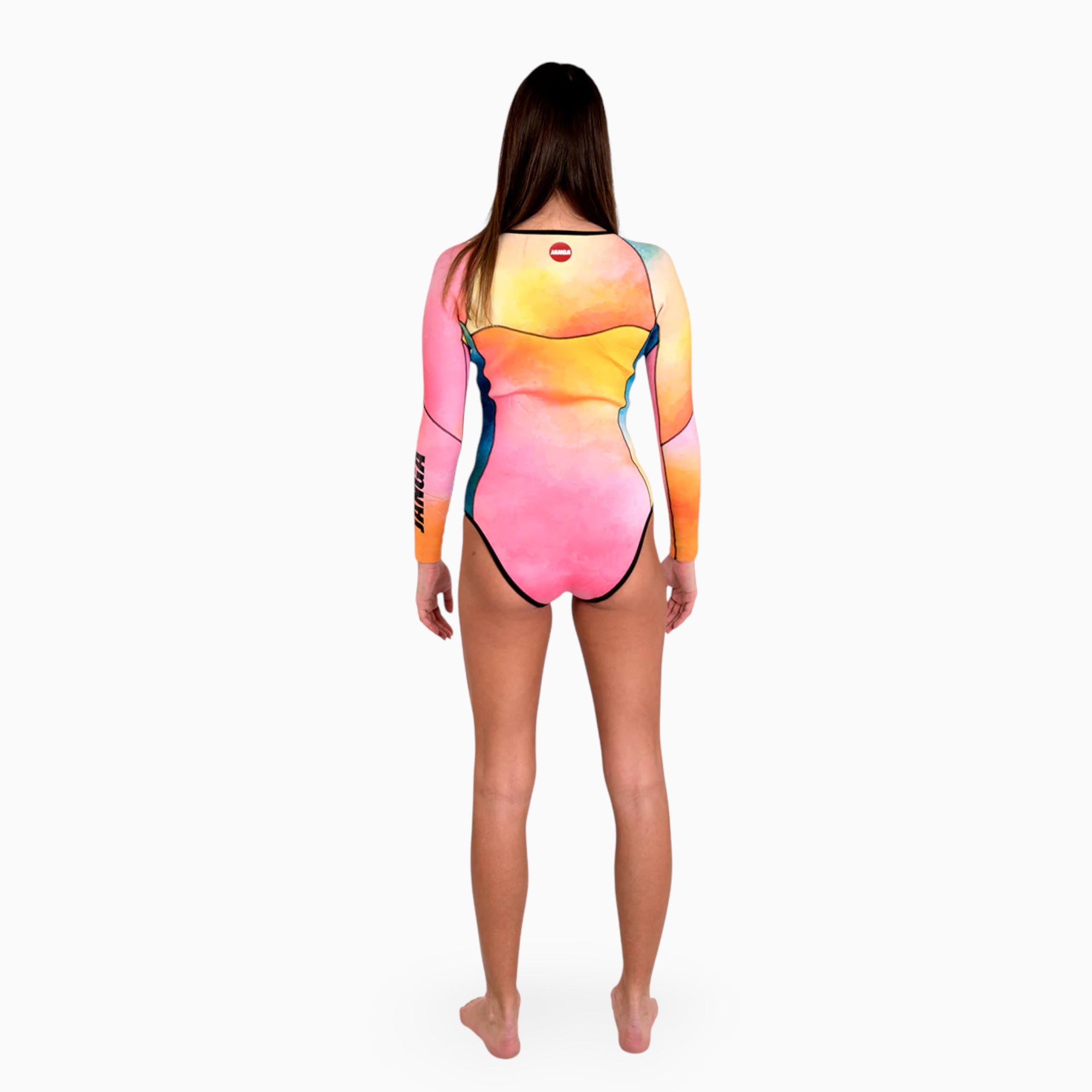 Surfer wearing JANGA ALL STARS TIE DYE women spring suit 2/2mm - back