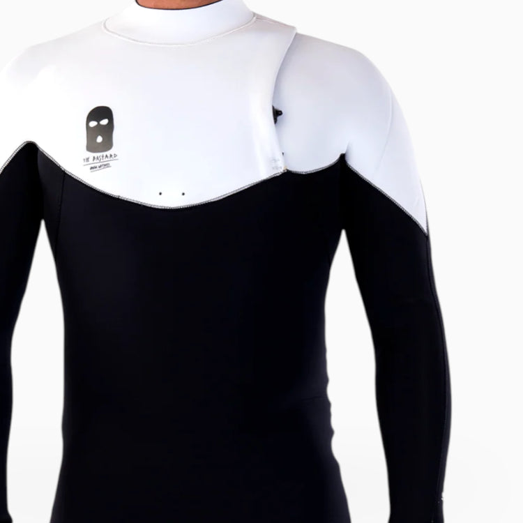 Surfer wearing a JANGA BASTARD black and white wetsuit on a white background zoom on no zip