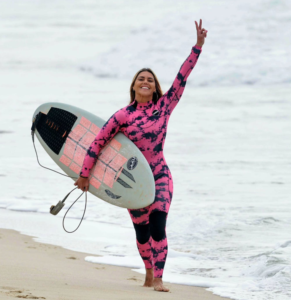 bellsurf wearing JANGA pink wetsuit