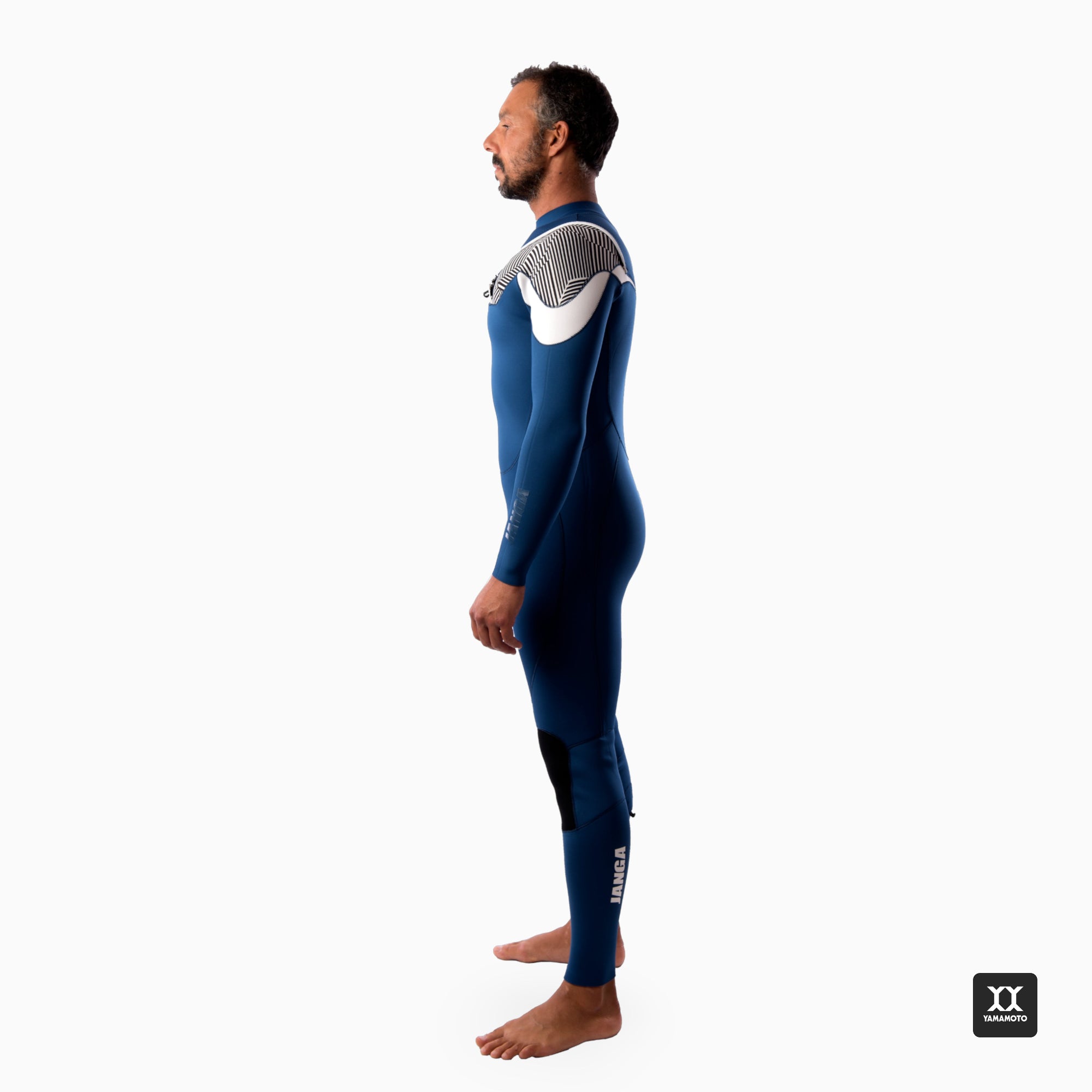 Surfer wearing a JANGA blue wetsuit with white accents on a white background