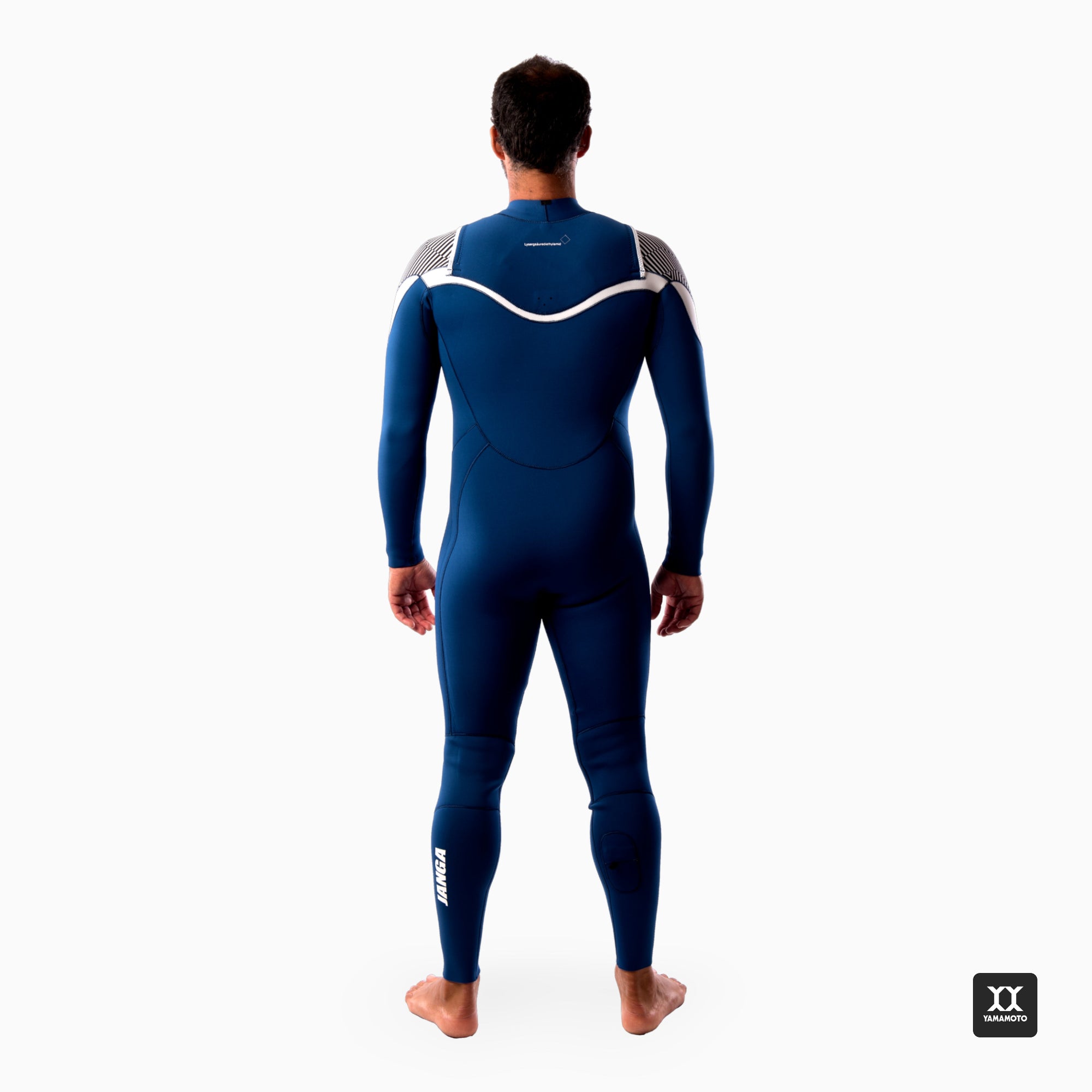 Surfer wearing a JANGA blue wetsuit with white accents on a white background - back