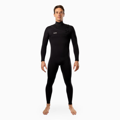 Surfer wearing a JANGA AIRFIGHTER black Yamamoto neoprene wetsuit on a white background 