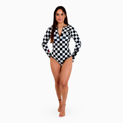 Surfer wearing JANGA ALL STARS CHECKERS women long sleeve spring suit 2/2 mm