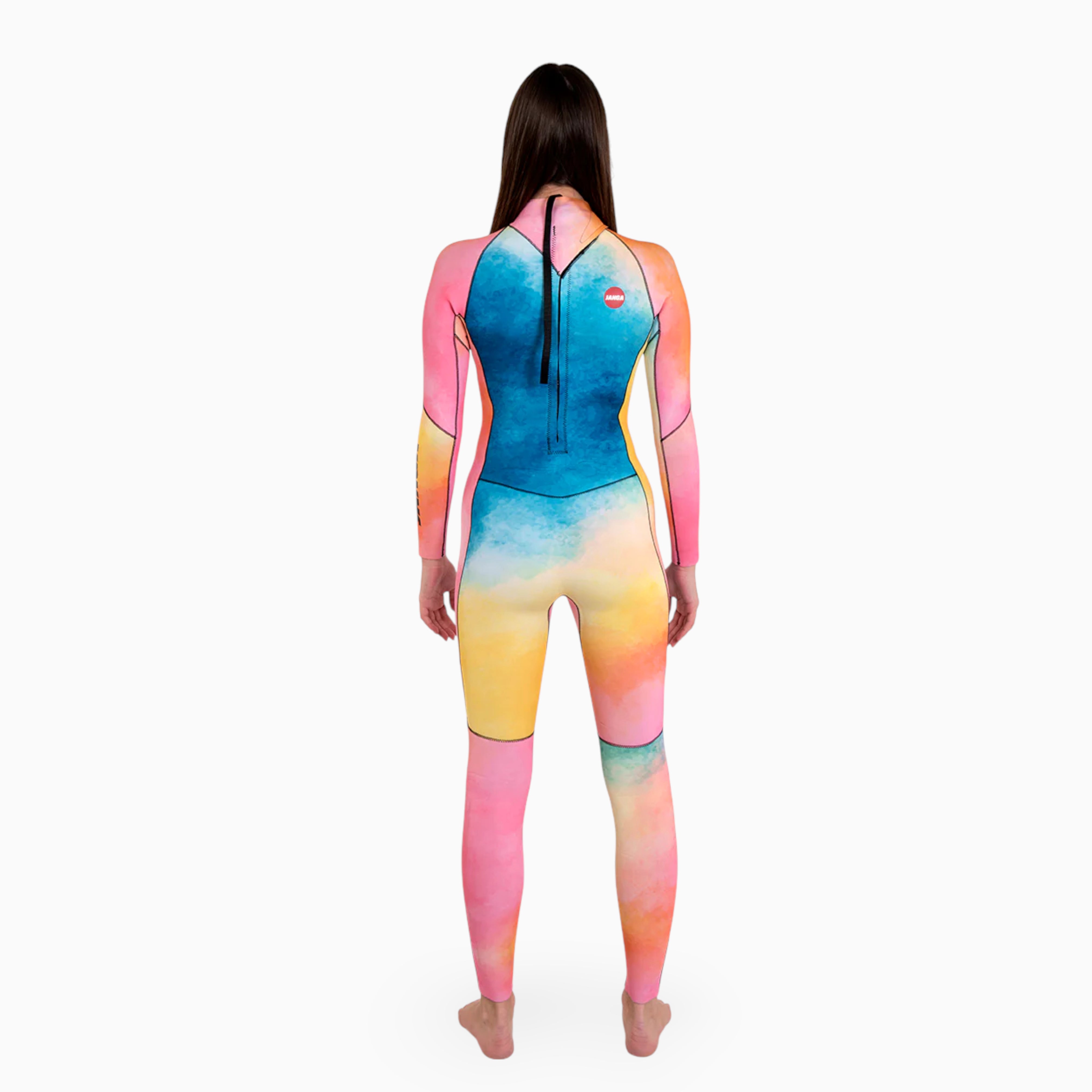 Surfer wearing JANGA ALL STARS TIE DYE women fullsuit 3/2mm - back