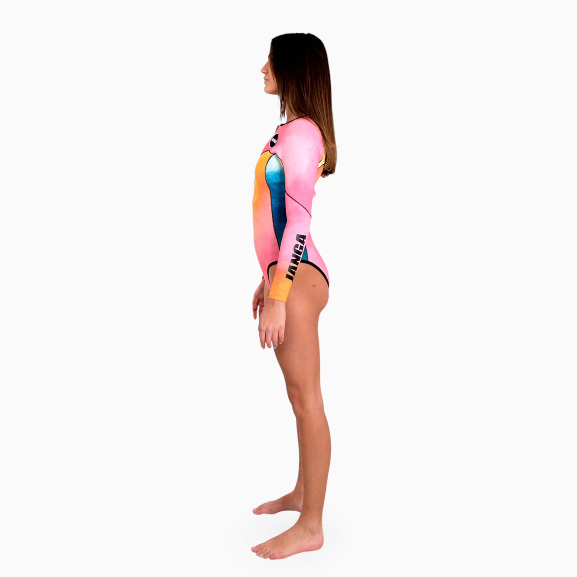 Surfer wearing JANGA ALL STARS TIE DYE women spring suit 2/2mm - side