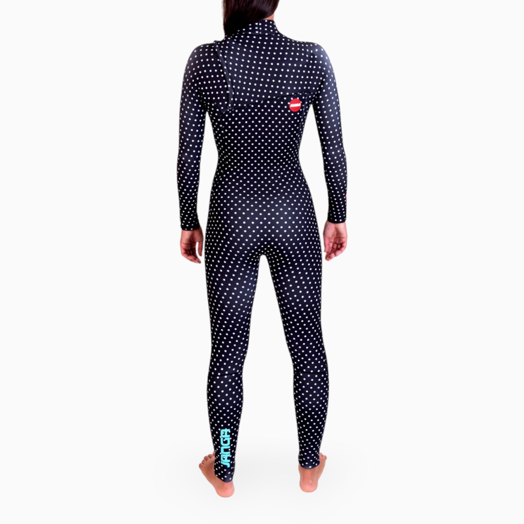 Surfer wearing JANGA COPYCAT women fullsuit 4/3 mm - back