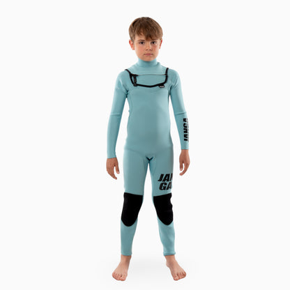 Surfer wearing JANGA Frontline kids wetsuit 2/2 mm blue - front