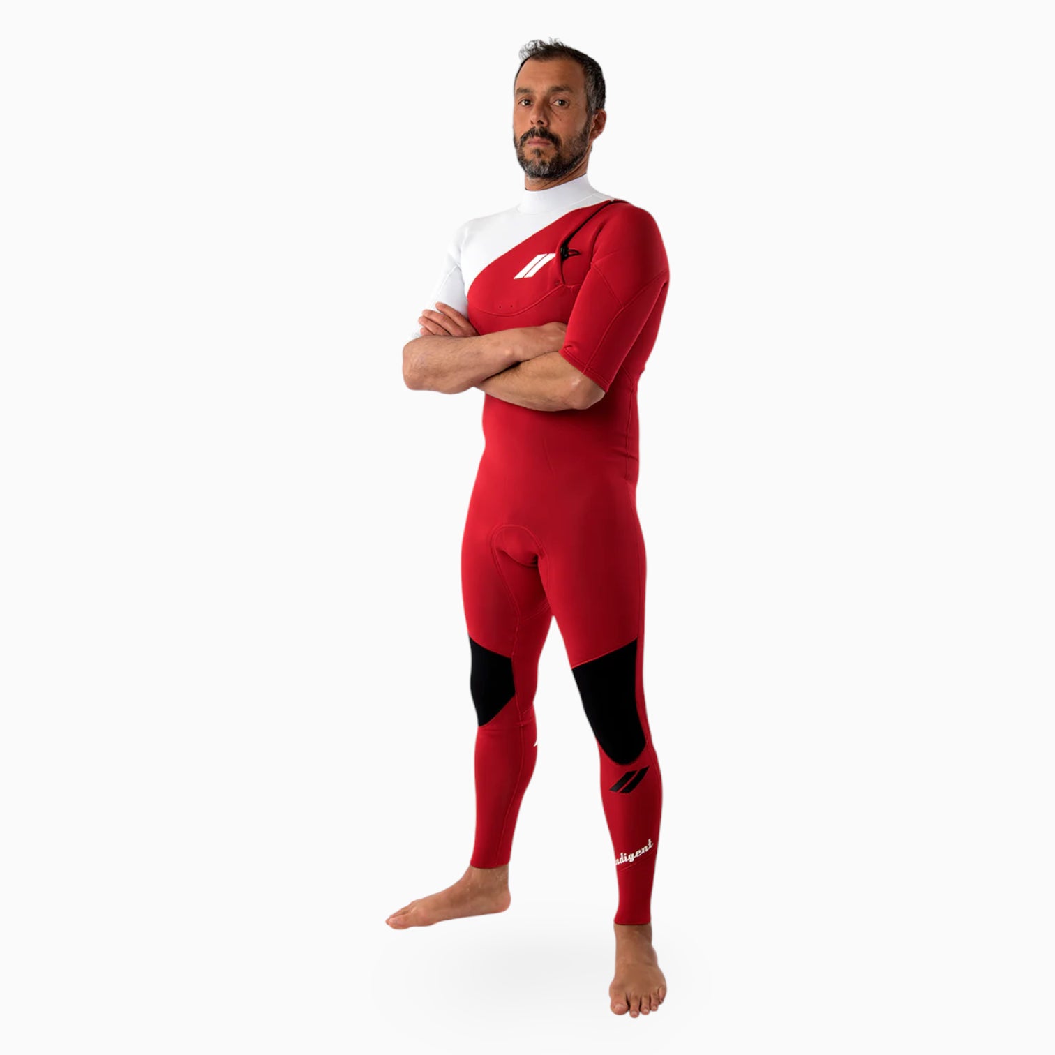 Surfer wearing a red and white JANGA Indigent wetsuit on a white background