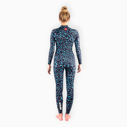 Surfer in Women's JANGA JANGLE wetsuit blue and grey leopard -back view