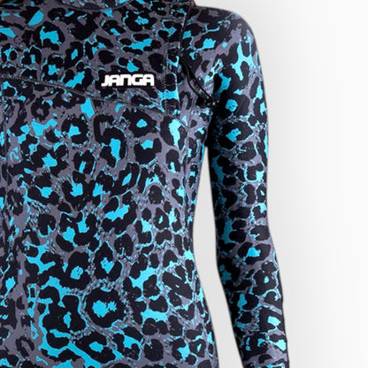 Surfer in Women's JANGA JANGLE wetsuit blue and grey leopard - zoom on chest