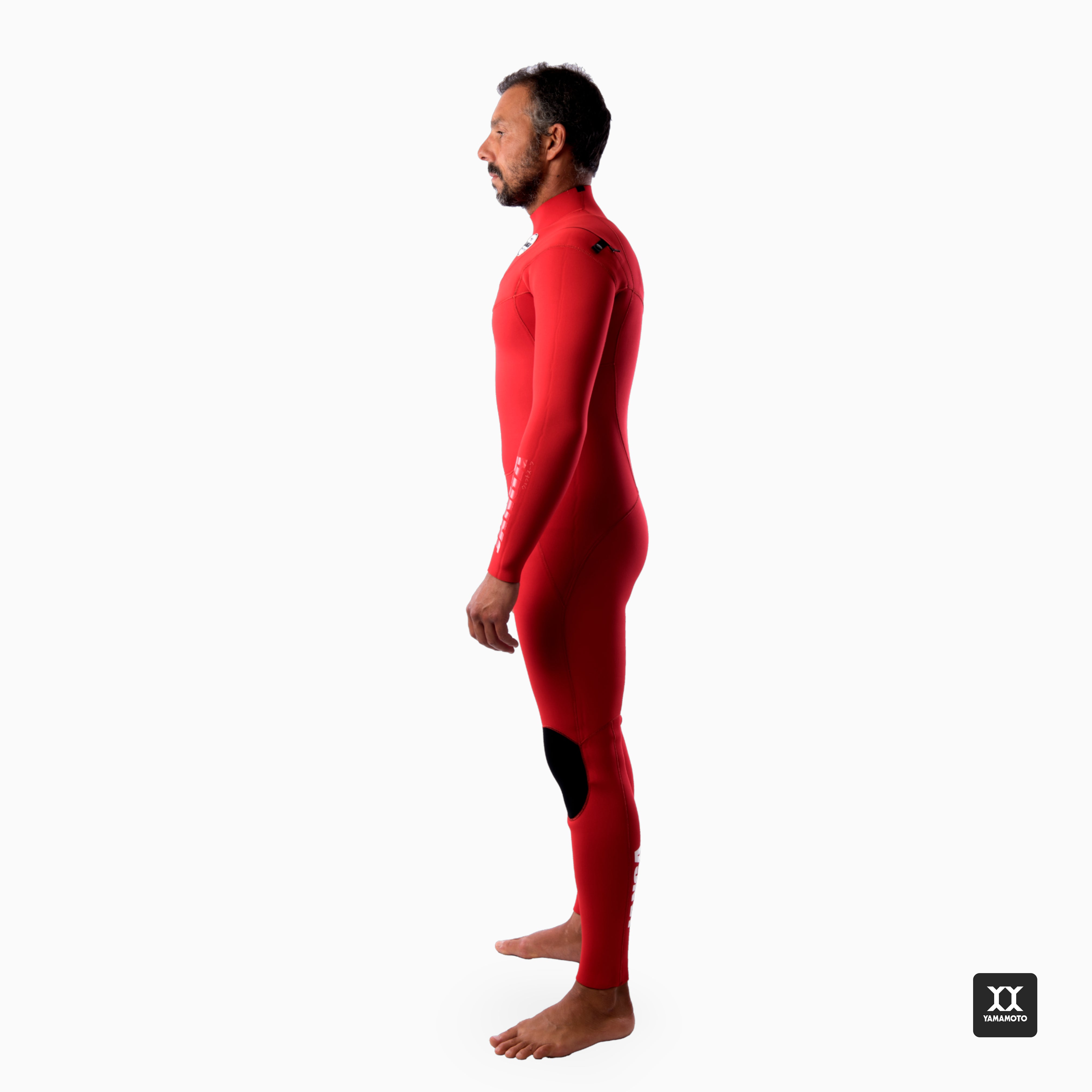 Surfer wearing JANGA PRO Fullsuit 4/3mm red - side