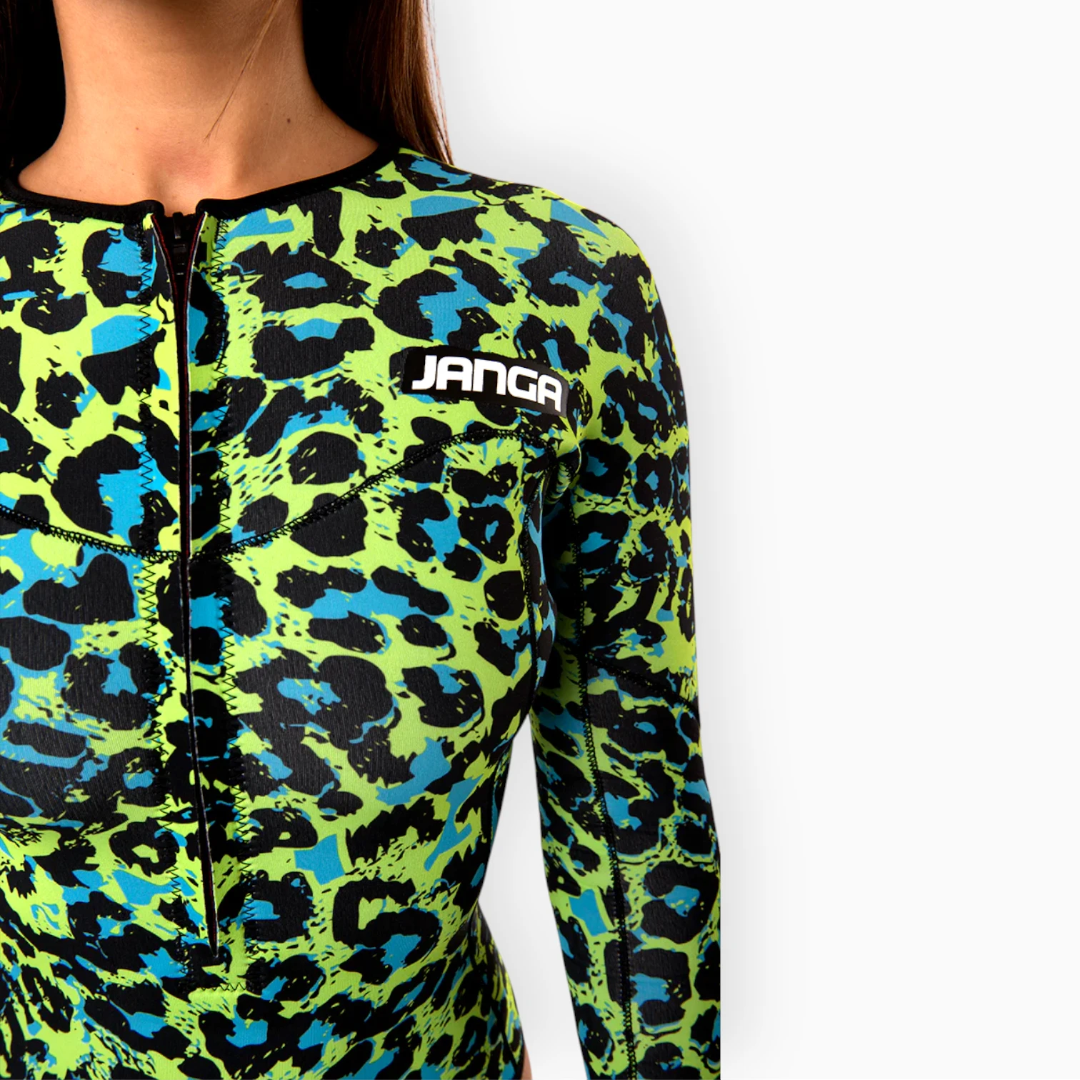 Surfer wearing Women's JANGA JANGLE Green Leopard short spring wetsuit - front view - zoom on front zip