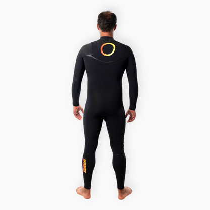 Male surfer wearing JANGA black wetsuit - Chosen Ring of Fire - back view