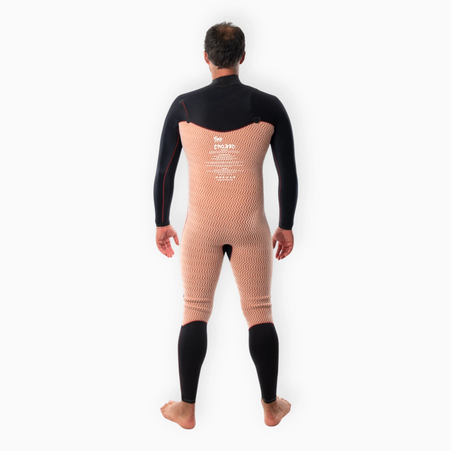 Male surfer wearing JANGA black wetsuit - Chosen Ring of Fire - thermal fleece inner lining back view