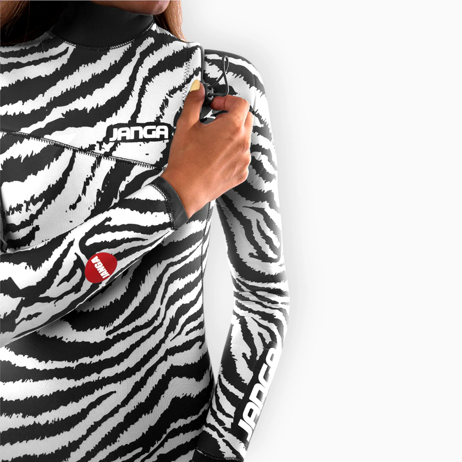 Surfer in Women's JANGA JANGLE ZEBRA wetsuit - zip free