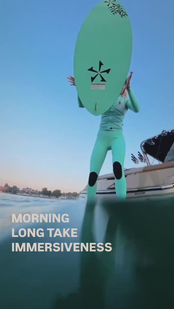 Load video: Wakesurfer Nadia Skripak @nadiaskripak in JANGA PRO BLUE wetsuit - morning wakesurf session