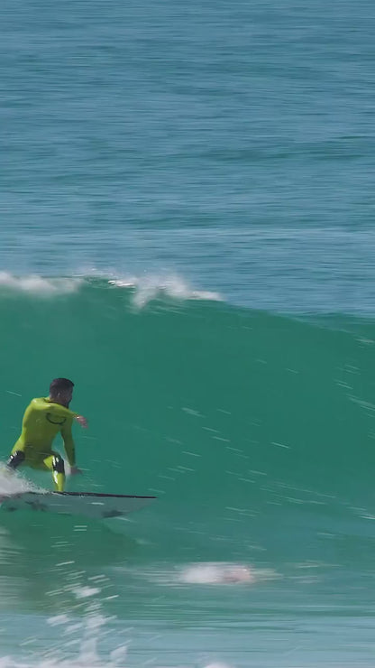 Surfer Michael Rodrigues @michaelrodrigues85 wearing JANGA Frontline Men wetsuit in green color